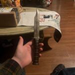 Is there any way to get the tarnish off my KA BAR without damaging it