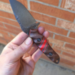 80crv2 Rust Blued finish with Sandblasted Burlap Micarta and G10.