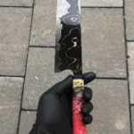 Torsion damascus core, tungsten steel and copper clad. A knife I won the first place with at my first knife exhibition