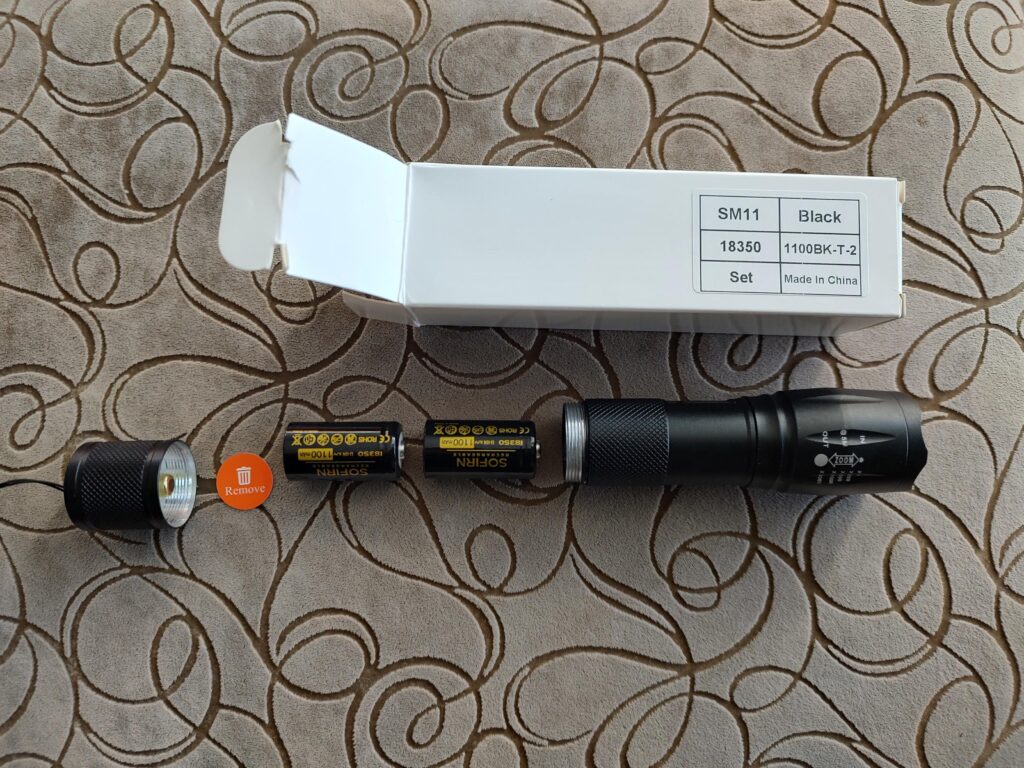 What battery is supposed to power this cheap flashlight?