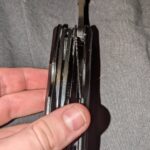 My pocket knife/multi tool got stuck, any ideas on how to fix it