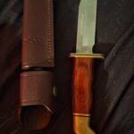 Idk what to do for a title but thought this knife was cool fixed blade with sheath