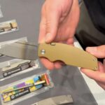 Oz machine company button compression lock?