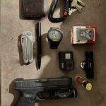 Young man’s EDC. Holster is damaged.