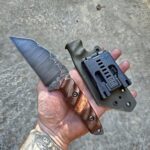 80crv2 Acid washed with burlap Micarta and Karelian Birch split and red G10 Liners.🤙