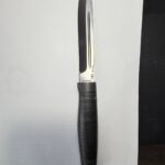 This is a finka, a knife from the Soviet era that became a symbol of its criminal underworld.