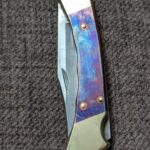 Custom Buck 110 with brass scales