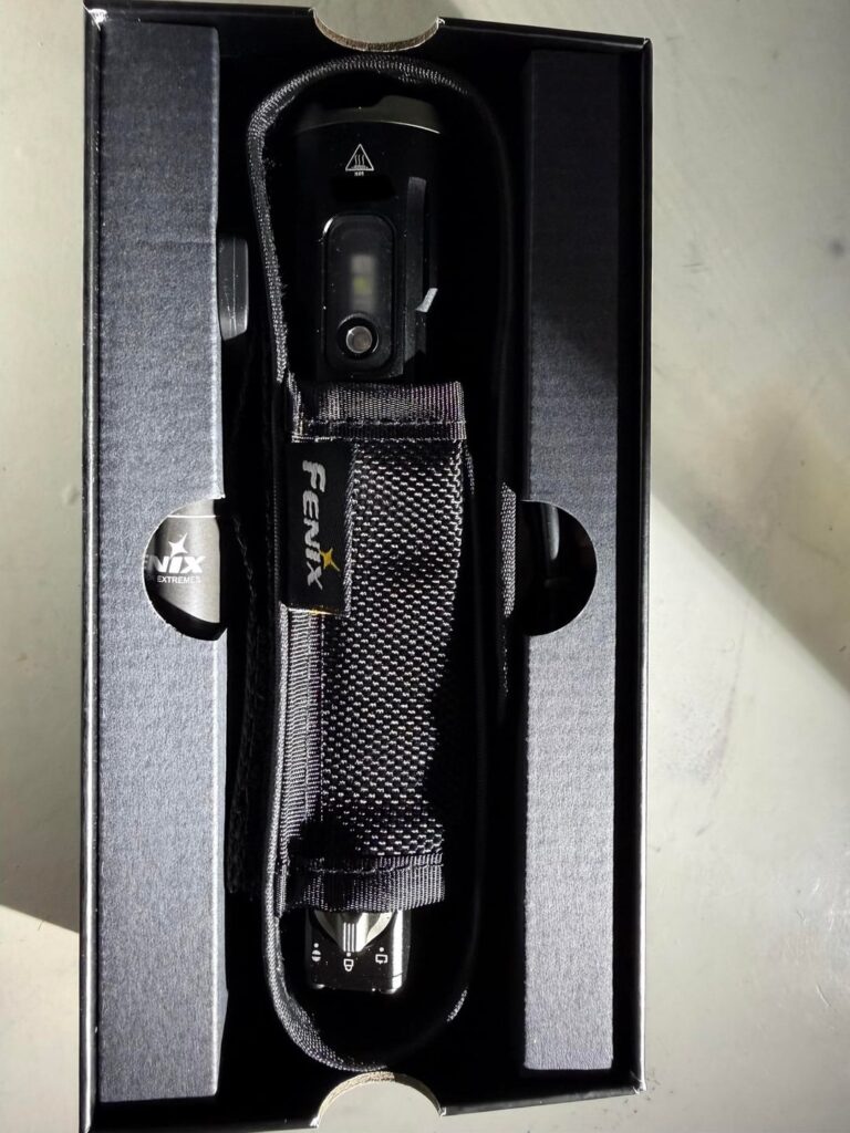 The Fenix TK25R with red,white,UV built into the head of the flashlight.