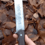 Outdoor knife I made a while ago in my little forge. I'll show mine, You show me yours!