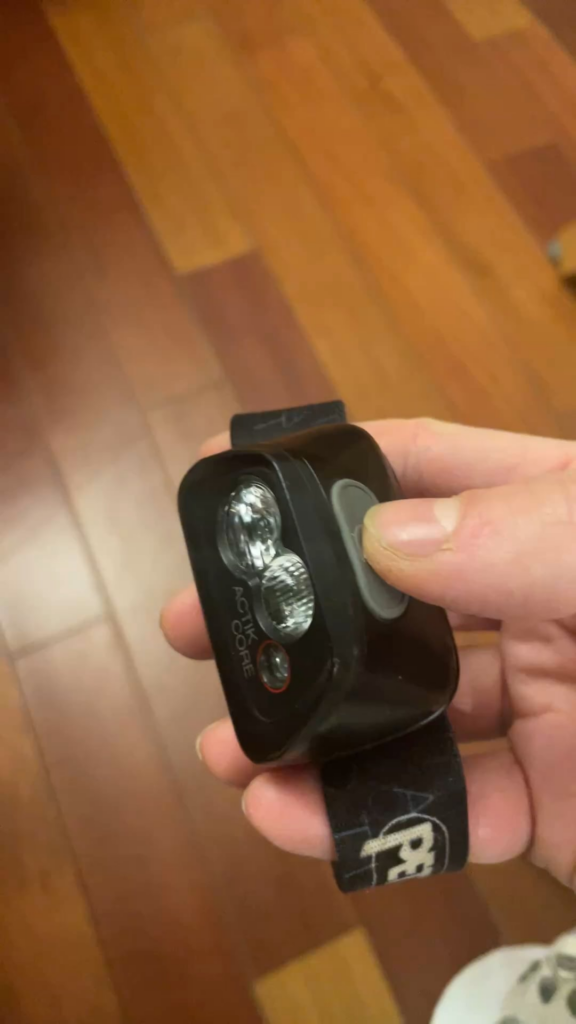 Need help! My Petzl Actik Core is faulty: it lights up red only while I press the button, turns off when I release it, and nothing happens with a 10-second long press.