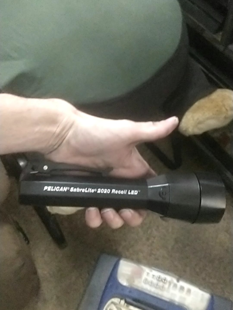 I bought a flashlight with an inwards facing LED mounted on a cross bar. Its called the pelican 2020 recoil flashlight
