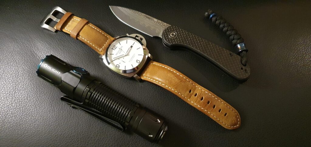 Trio: Knife, watch and flashlight