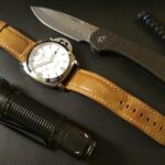 Trio: Knife, watch and flashlight