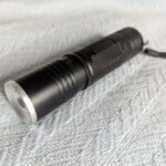 Unidentified white label/unbranded zoom flashlight Convoy threw into my order. Help to ID it?