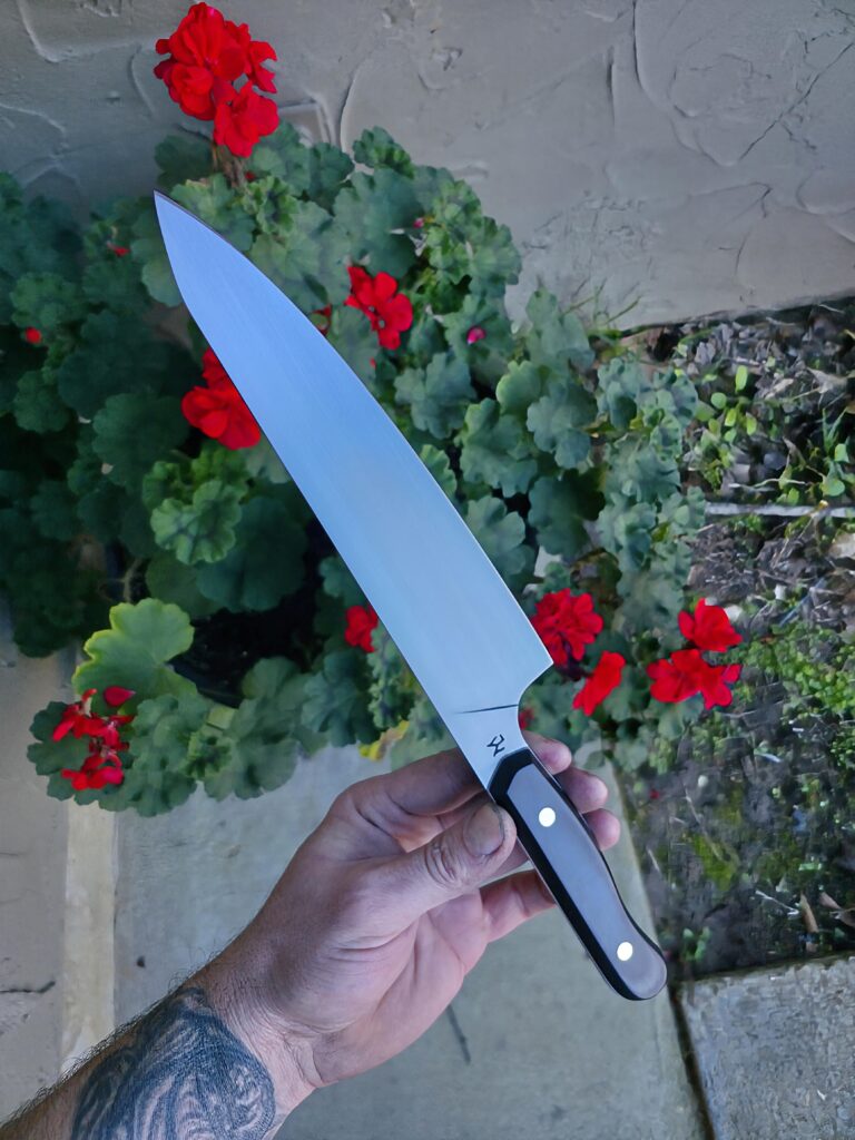 15N20 and black G10 with white liners and brass pins🤙