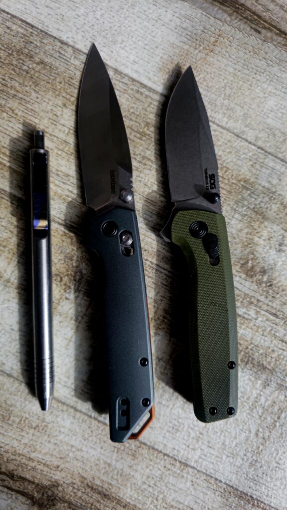 What's everyone carrying today? Here's my pocket check ✔️ ~Ti pen (not sure the brand) with ti clip. ~Kershaw iridium aluminum scales and a D2 Blade ~SOG Terminus XR G10 scales W/ their signature CRYO D2 steel.