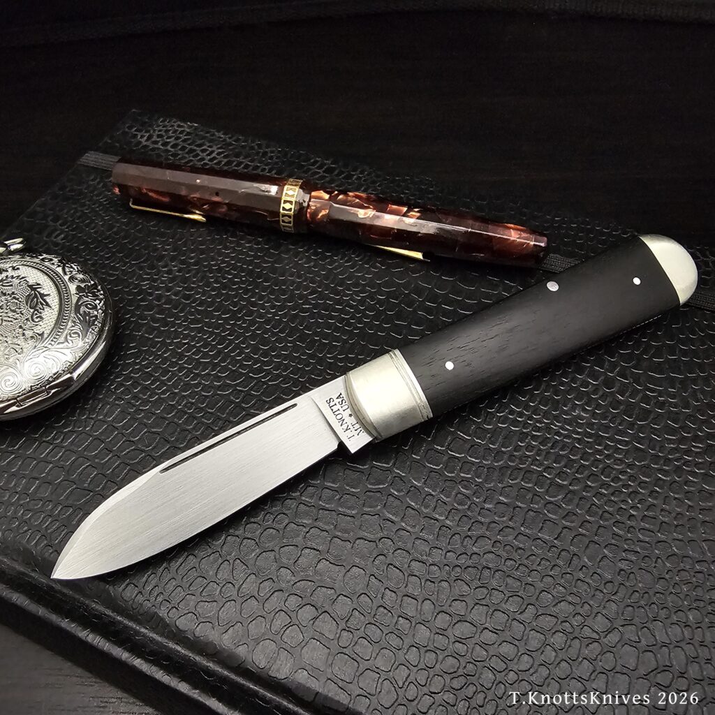 Spear Point in O1 with Ebony Covers