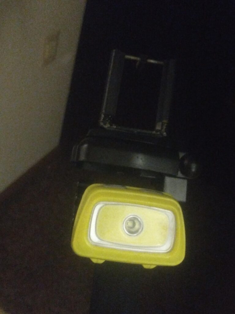 I decided to bolt one of my head lamp flashlights to my make shift monopod