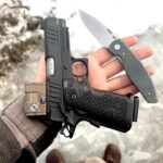 A lint covered gun and a knife with new scales.