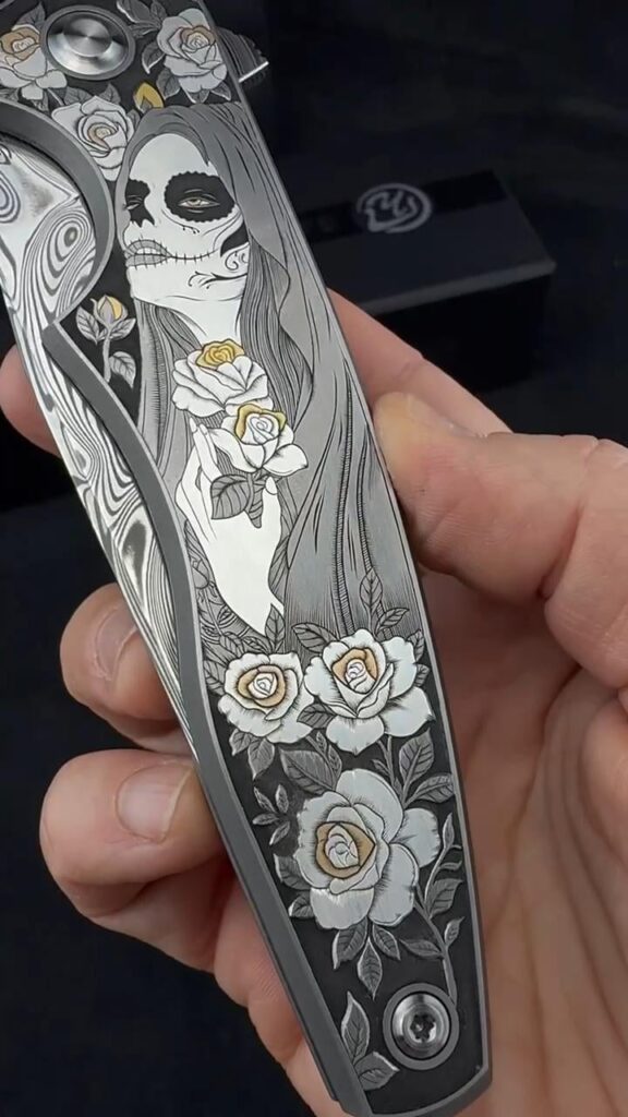 Hand-engraved titanium knife scale by Noblie