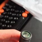 Noob question and help. Identifying this style of lens on top of this flashlight?