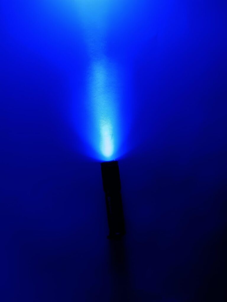 I tried to dedome my olight i3e eos and now its really nice looking blue and has more throw. I think that i accidentally removed the phosphor layer but im not complaining :D