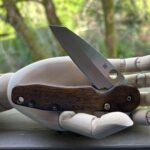 Sharpened, cleaned, oiled, and waxed my customized Unc Smock with walnut scales