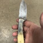 Grandpas old work knife no idea what it is and was wondering if I should use it as my work knife or try to clean it up and get it restored