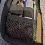 What can I put in the bottom mesh bit in my pouch?