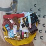 Everything I have in my bag today. Tell me about myself