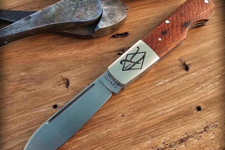 Spear point Barlow with Narra wood covers.
