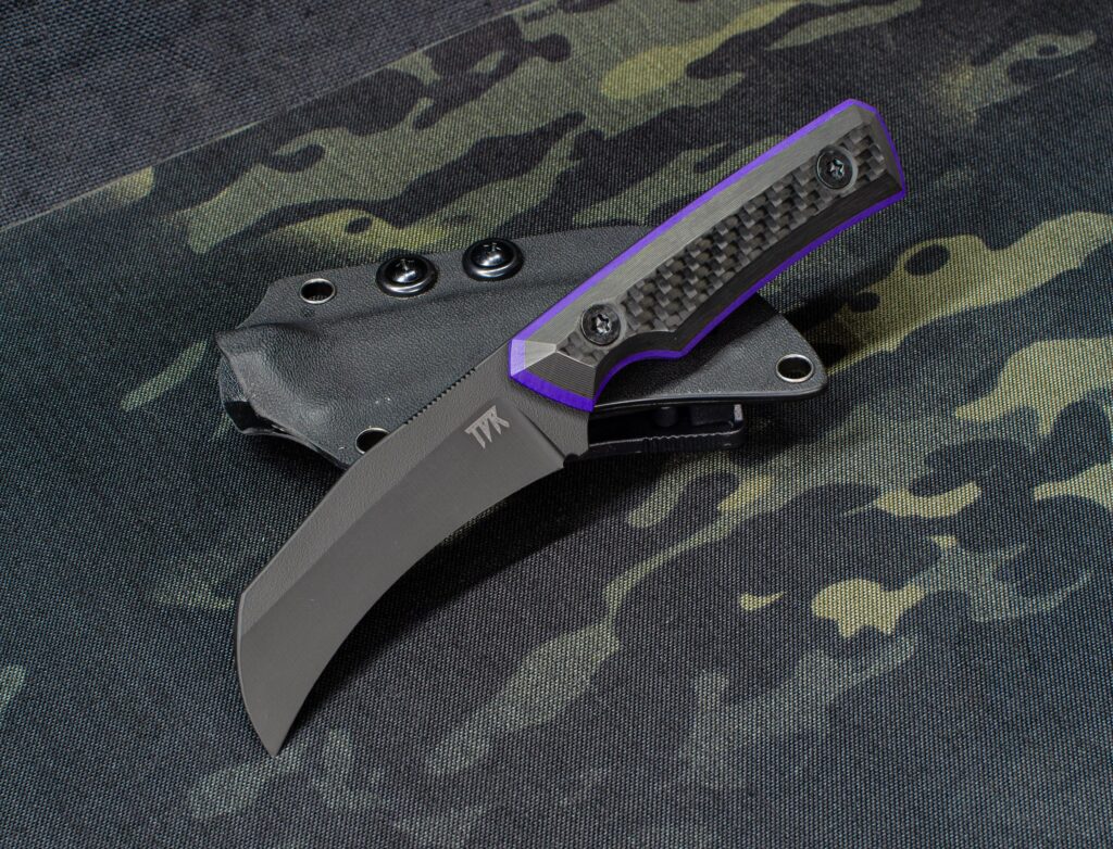 Lineman V1 knife. Cerakoted CPM 4V with Carbon/G10 scales. Yall dig this color combo?