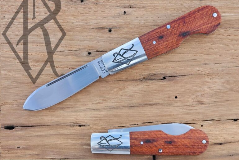 Spear point Barlow with Narra wood covers.