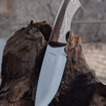 Just finished this one. Made of 9KhF, Soviet chromium-vanadium high carbon steel, Handle of Walnut with brass inlay and pins. 58-59 HRC. DM if interested