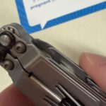 I have a PowerPint that has been great but there are two things wrong with it. 1. Some of the tools are really stiff to get out. Even after a couple months of usage. And 2. My scissors don’t seem to go all the way down when they are closed. Any help or tips is appreciated.