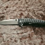 They're asking $205 for this knife, do you think it's worth it, and how can I tell if it's genuine?