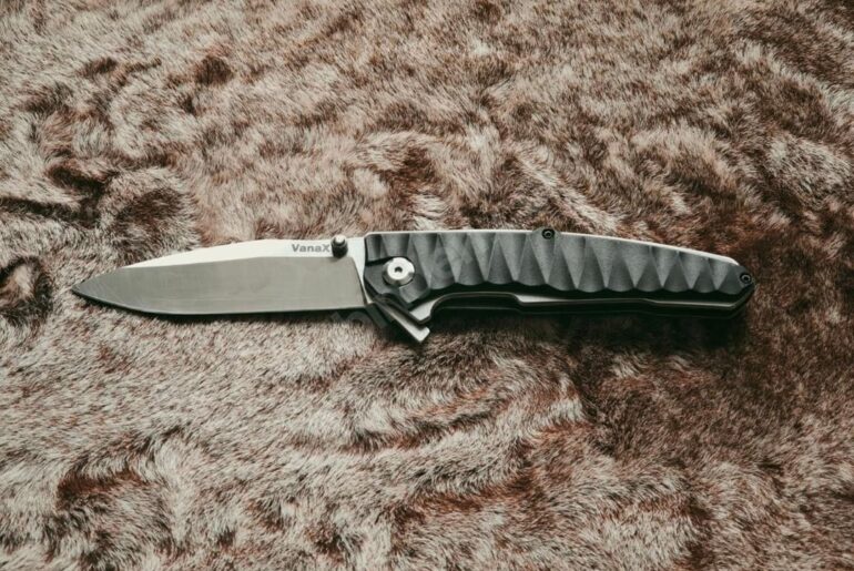 They're asking $205 for this knife, do you think it's worth it, and how can I tell if it's genuine?