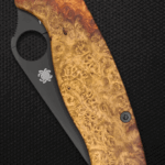 Spyderco PM2 rocking stabilized Amboyna burl scales.