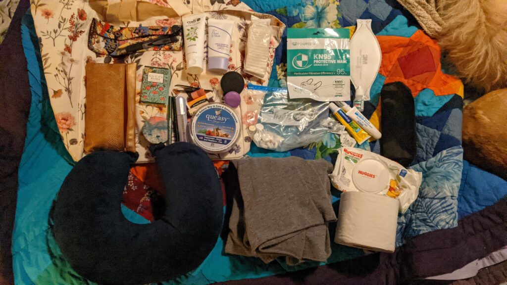 The cream/floral is the actual bag and then this is what I keep in it :)