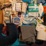 The cream/floral is the actual bag and then this is what I keep in it :)