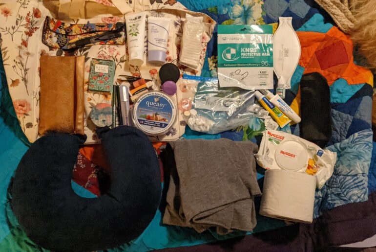 The cream/floral is the actual bag and then this is what I keep in it :)