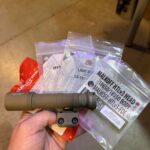 Weapon mounted flashlights