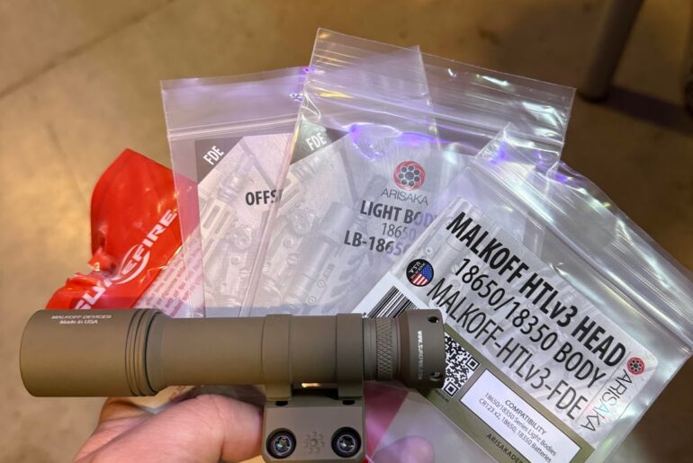 Weapon mounted flashlights