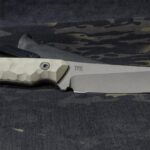 Apex Ultra EDC, single hollow bevel, Tungsten Cerakote and Desert tan scales. A wild commission, that's for sure