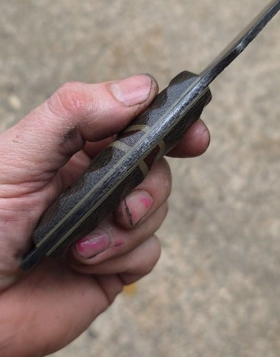 1084 Acidwashed finish with OD Green Sandblasted Burlap Micarta, Splits natural Burlap Micarta with OD Green G10 and Earth Brown G10. Liners are OD Green G10.