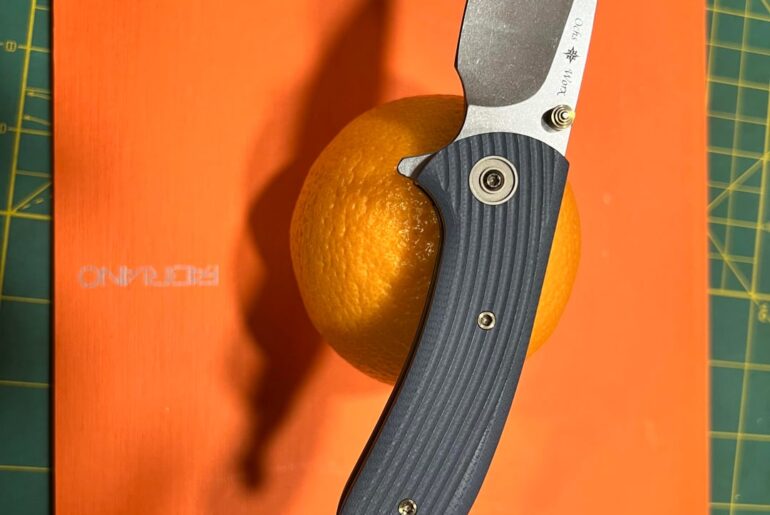 Ochs Worx: Blue Grooves, Brass Stud, and a Very Nervous Orange