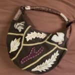 thrifted green bag vs slouchy brown bag? what do my things say about me? <3