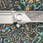 NKD - Sharp By Design T10