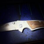 How to tighten this rivet? Screw? Beater Ozark Trail folder.