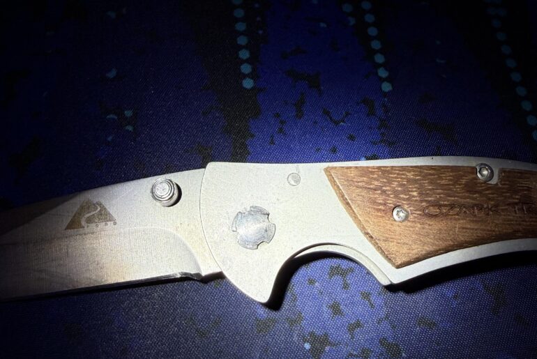 How to tighten this rivet? Screw? Beater Ozark Trail folder.